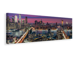 panoramic-canvas-print-manhattan-skyline-during-beautiful-sunset